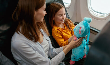 child surprised by a plush gift