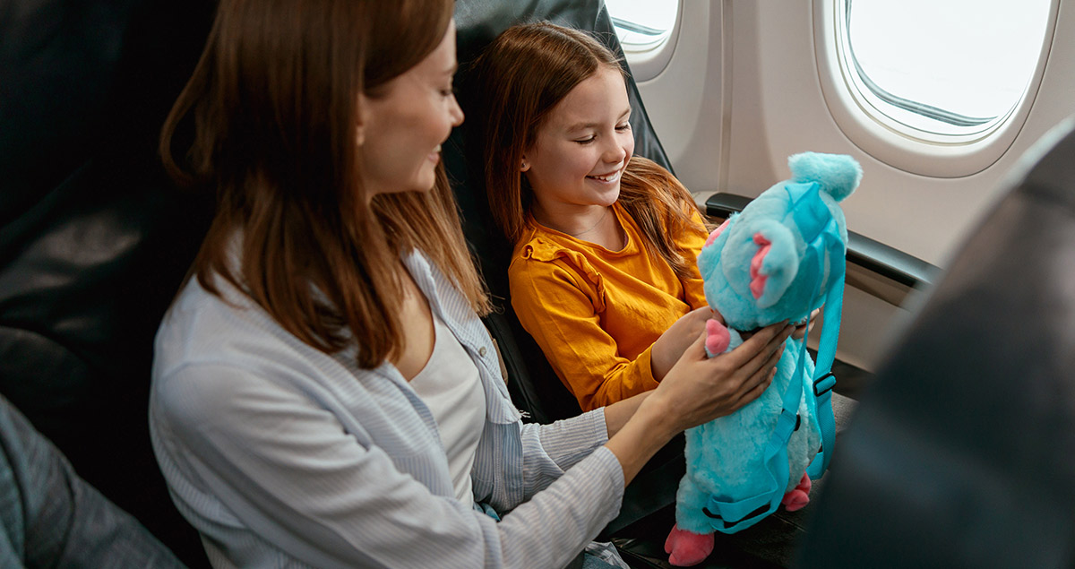 child surprised by a plush gift